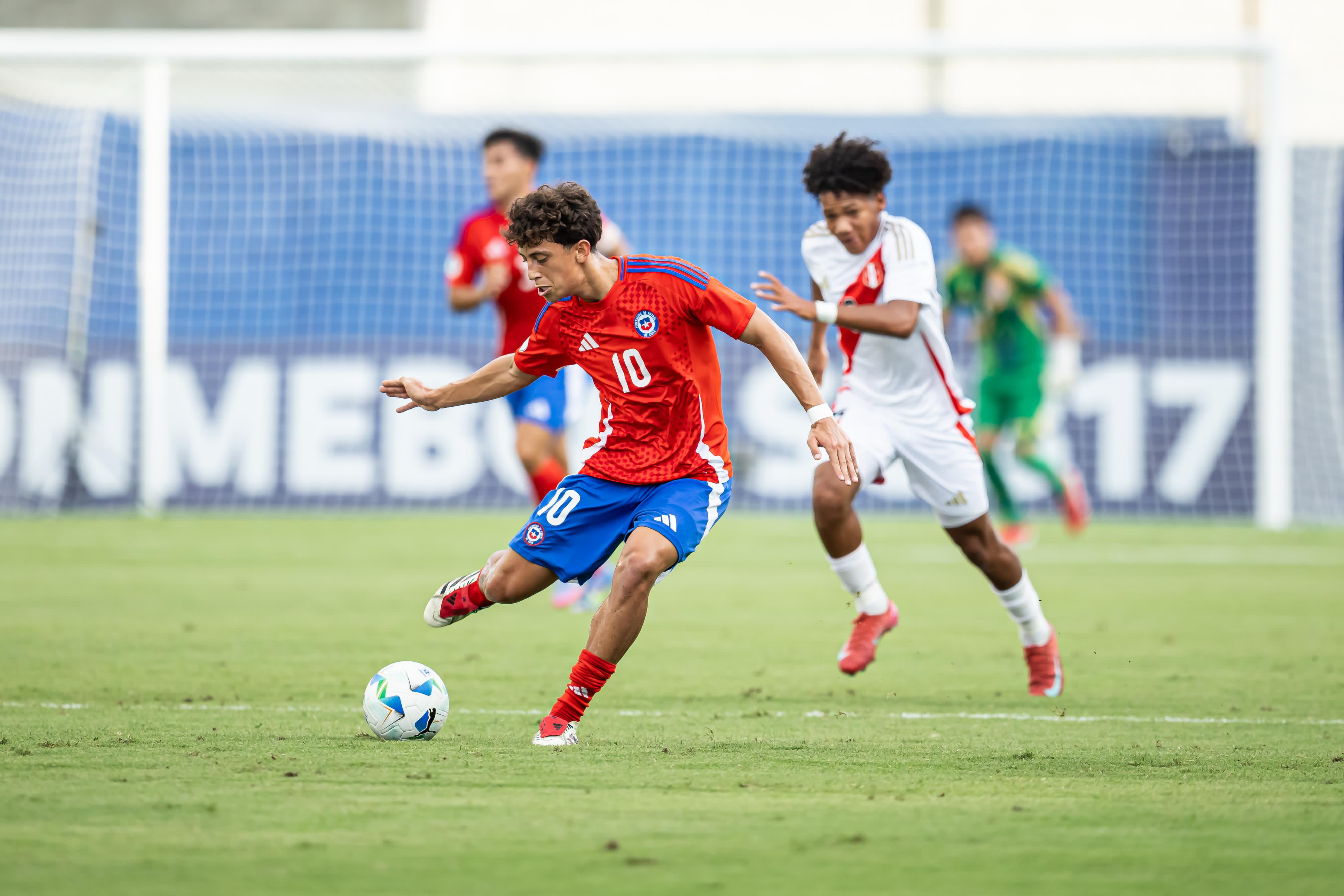 Zidane Yañez striking the ball for Chile